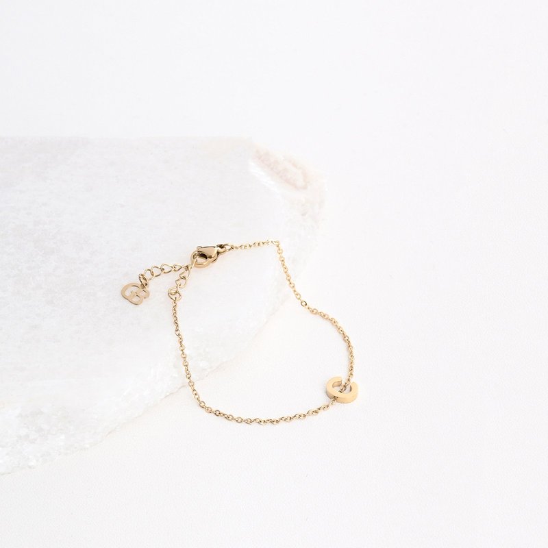 Pulseira em aço letra
