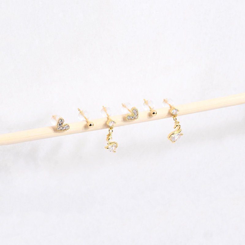 Conjunto brincos banho ouro cisne