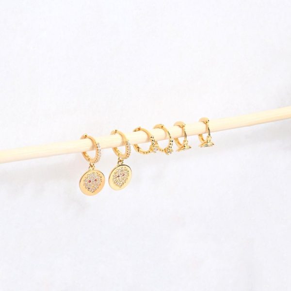 Conjunto brincos banho ouro leão